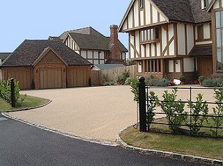 Driveway: Resin bonded surface Road: tarmac AC10