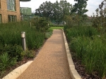 Podium Finished Resin Bonded surface on Asphalt footway construction