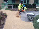 Resin bound gravel being laid on block H at Kidbrooke Park